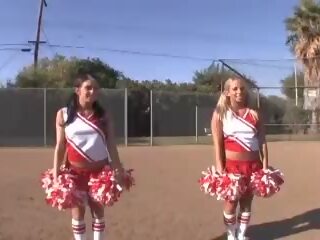 Cheerleader Girls after Football Game with Quarterback